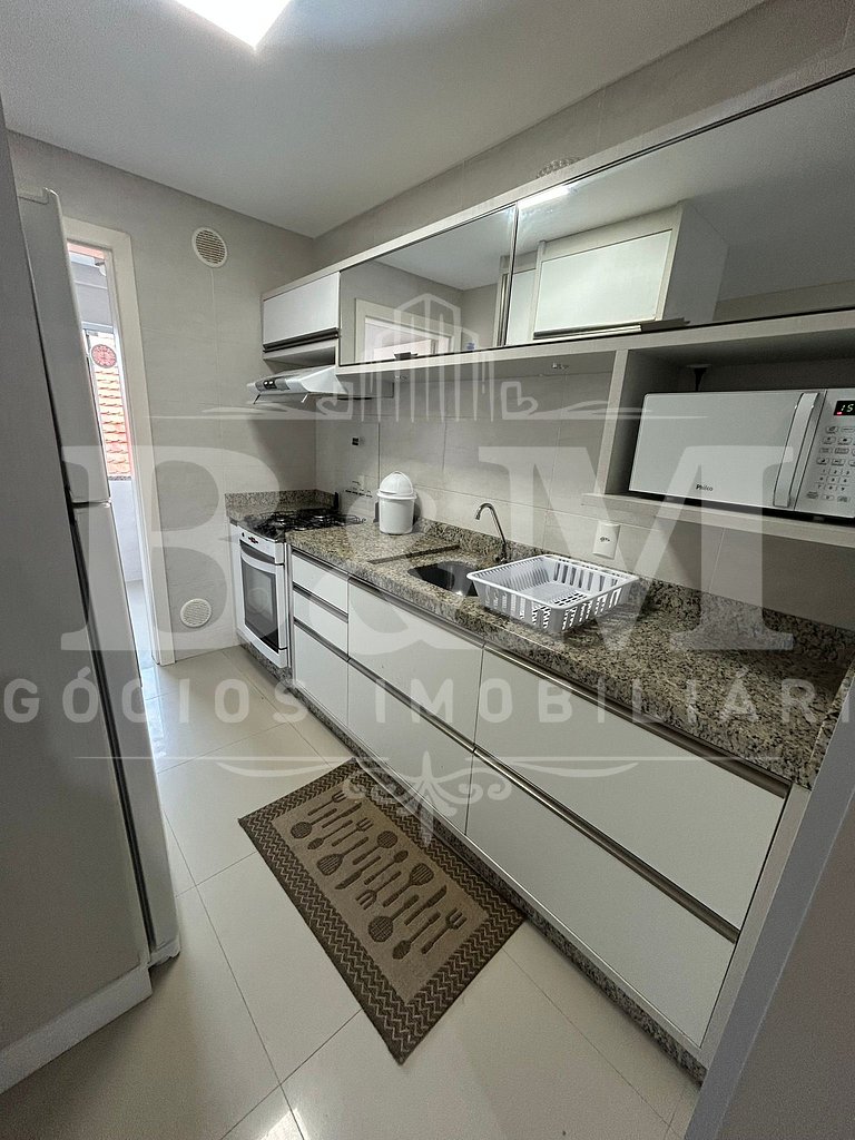 apartamento em canto grande com vista mar