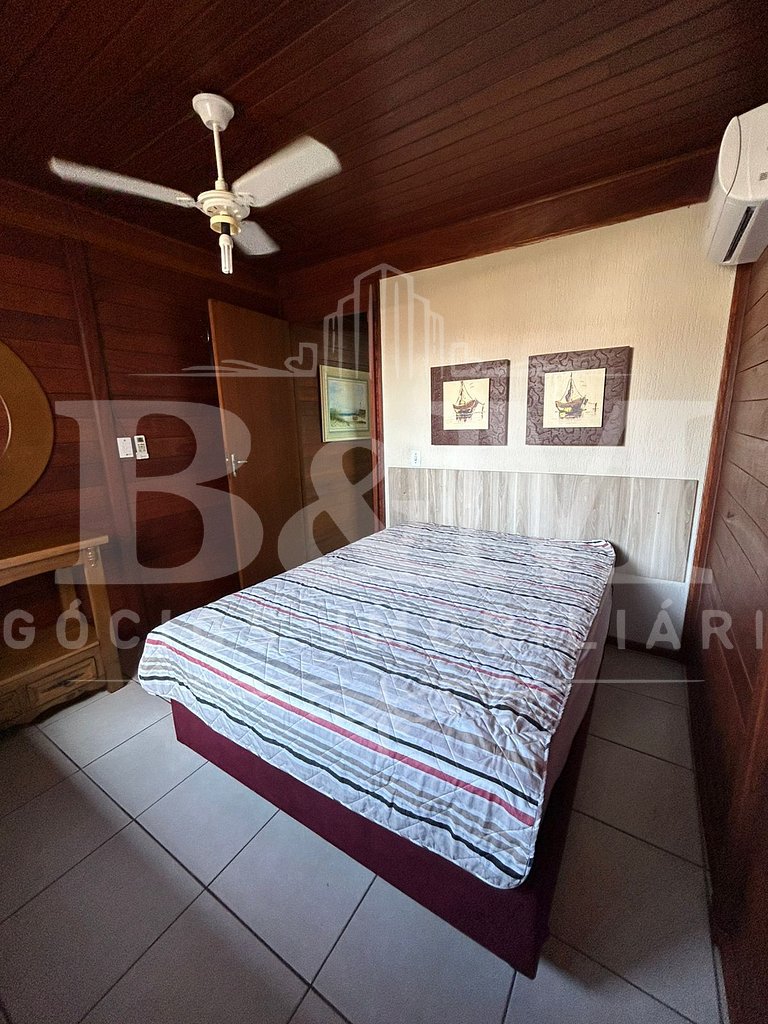 Linda Casa em zimbros