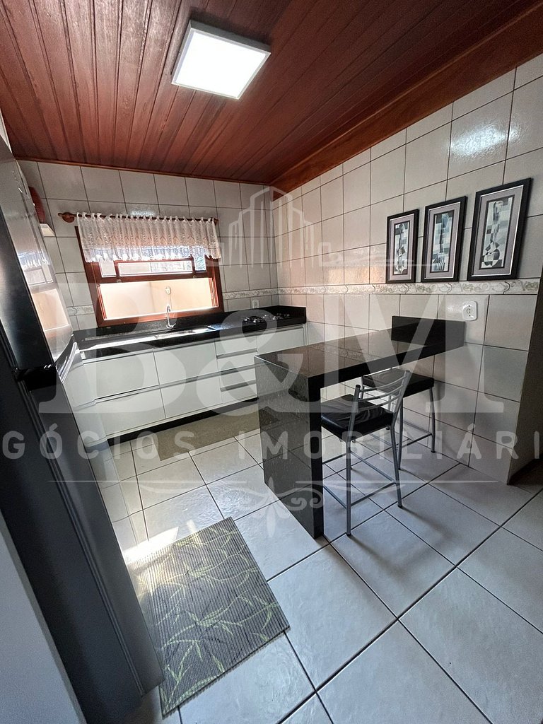 Linda Casa em zimbros