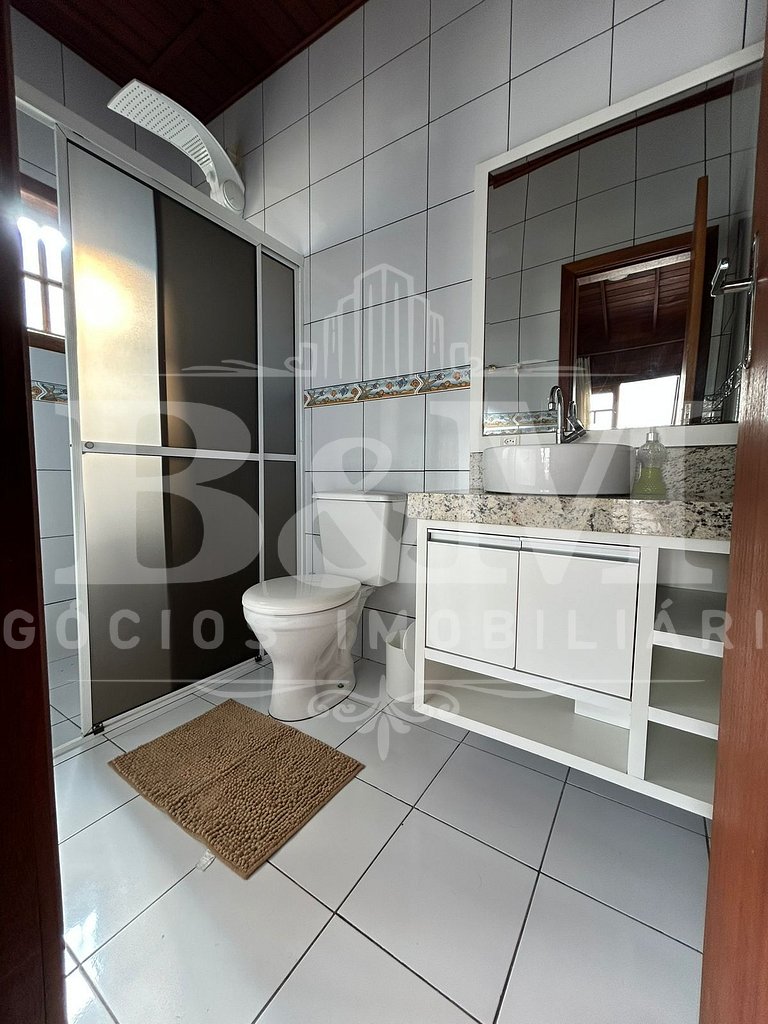 Linda Casa em zimbros